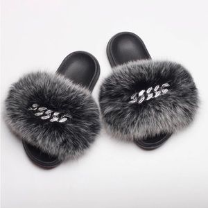 NWOT-Slipper, faux fur, rhinestone embellished, indoor-outdoor sole. New. Size 7